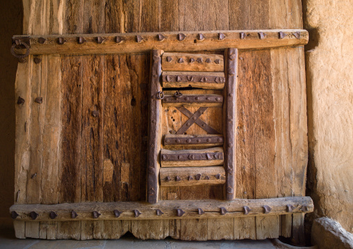 Old wooden door in musmak fort, Riyadh Province, Riyadh, Saudi Arabia