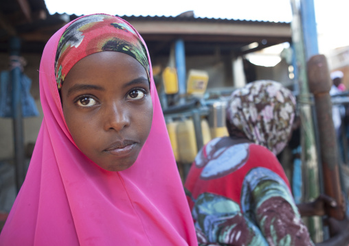 Portrait Of A Thoughtful Teenage Girl Wearing A Flashy Pink Hijab, Boorama, Somaliland