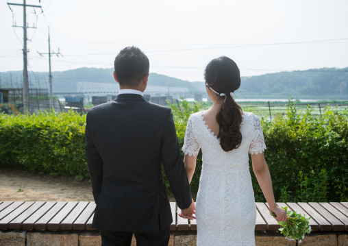 North korean defector joseph park with his south korean fiancee juyeon on the north and south korea border, Sudogwon, Paju, South korea