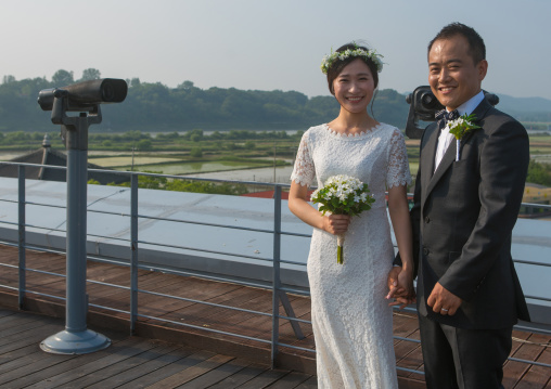 North korean defector joseph park with his south korean fiancee juyeon on the north and south korea border, Sudogwon, Paju, South korea