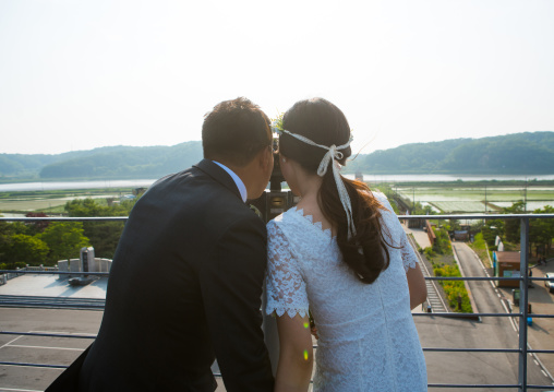 North korean defector joseph park with his south korean fiancee juyeon on the north and south korea border, Sudogwon, Paju, South korea