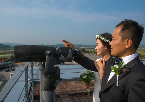 North korean defector joseph park with his south korean fiancee juyeon on the north and south korea border, Sudogwon, Paju, South korea