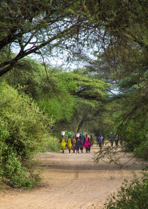 Toposa people coming back from the market, Namorunyang State, Kapoeta, South Sudan