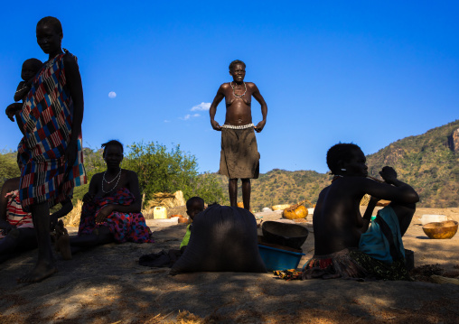 Larim tribe women resting after grinding, Boya Mountains, Imatong, South Sudan