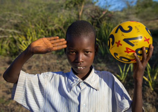 Portrait of a Larim tribe boy saluting with the hand, Boya Mountains, Imatong, South Sudan