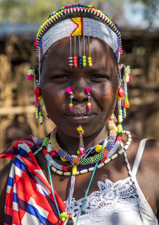 Portrait of a Larim tribe woman with a lot of decorations, Boya Mountains, Imatong, South Sudan