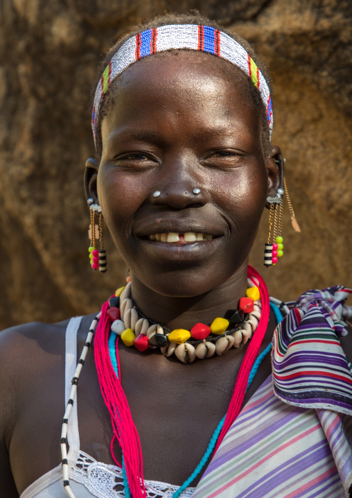 Smiling Larim tribe woman during a wedding celebration, Boya Mountains, Imatong, South Sudan
