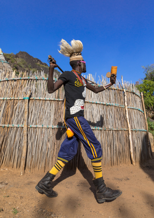 Larim tribe man dancing during a wedding ceremony, Boya Mountains, Imatong, South Sudan