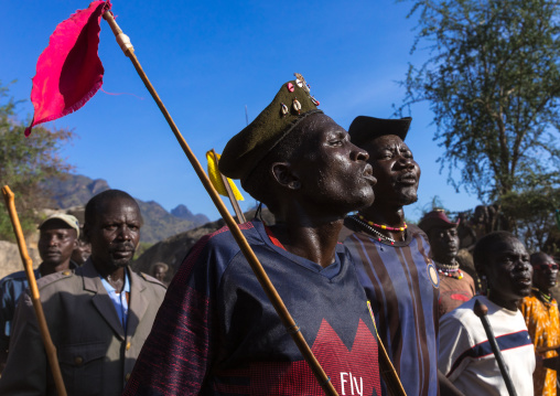 Larim tribe men dancing during a wedding ceremony, Boya Mountains, Imatong, South Sudan