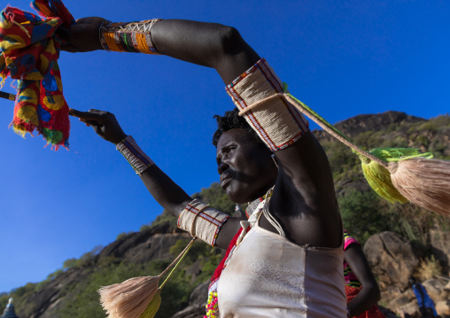 Larim tribe woman dancing during a wedding celebration, Boya Mountains, Imatong, South Sudan