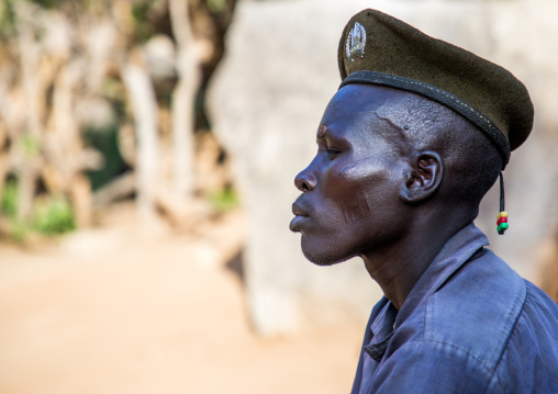 Portrait of a Larim tribe man wearing a military beret, Boya Mountains, Imatong, South Sudan
