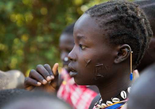Scarifications on the cheek of a Larim tribe young woman, Boya Mountains, Imatong, South Sudan