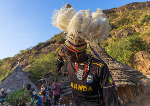 Larim tribe men dancing during a wedding ceremony, Boya Mountains, Imatong, South Sudan