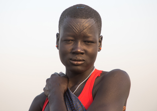 Portrait of a Mundari tribe woman with scarifications on the forehead, Central Equatoria, Terekeka, South Sudan