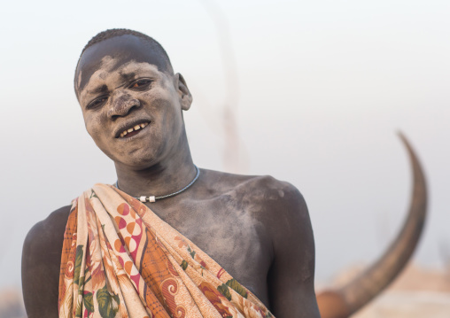 Mundari tribe man covered in ash to repel flies and mosquitoes, Central Equatoria, Terekeka, South Sudan