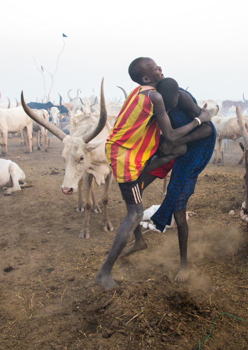 Mundari tribe boys wrestling in a cattle camp, Central Equatoria, Terekeka, South Sudan