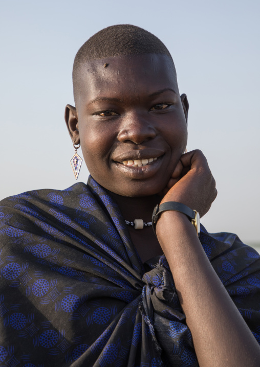 Portrait of a smiling Mundari tribe woman, Central Equatoria, Terekeka, South Sudan