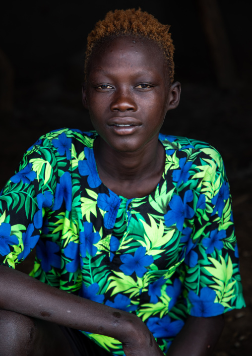 Portrait of a Mundari tribe man with hair dyed in orange with cow urine, Central Equatoria, Terekeka, South Sudan