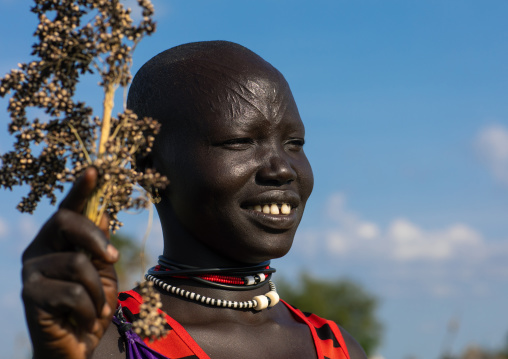 Portrait of a Mundari tribe woman with scarifications on the forehead, Central Equatoria, Terekeka, South Sudan
