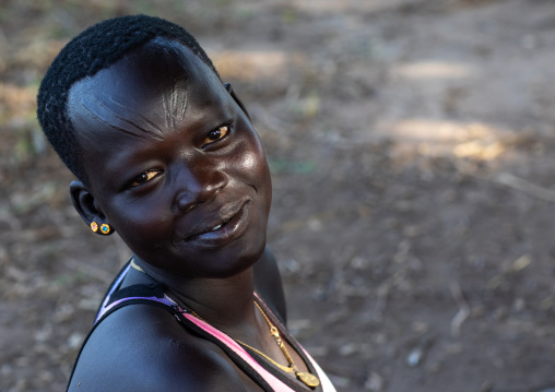 Portrait of a Mundari tribe woman with scarifications on the forehead, Central Equatoria, Terekeka, South Sudan