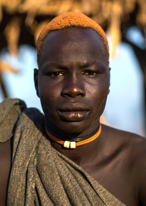 Portrait of a Mundari tribe man with hair dyed in orange with cow urine, Central Equatoria, Terekeka, South Sudan