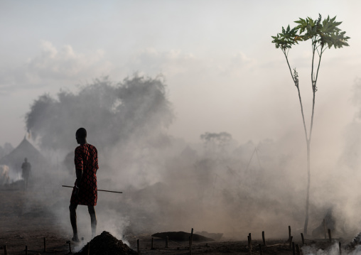 Bonfire to take away the mosquitoes and the flies in a Mundari cows camp, Central Equatoria, Terekeka, South Sudan