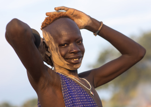 Mundari tribe boy covered in ash to protect from the mosquitoes and flies, Central Equatoria, Terekeka, South Sudan