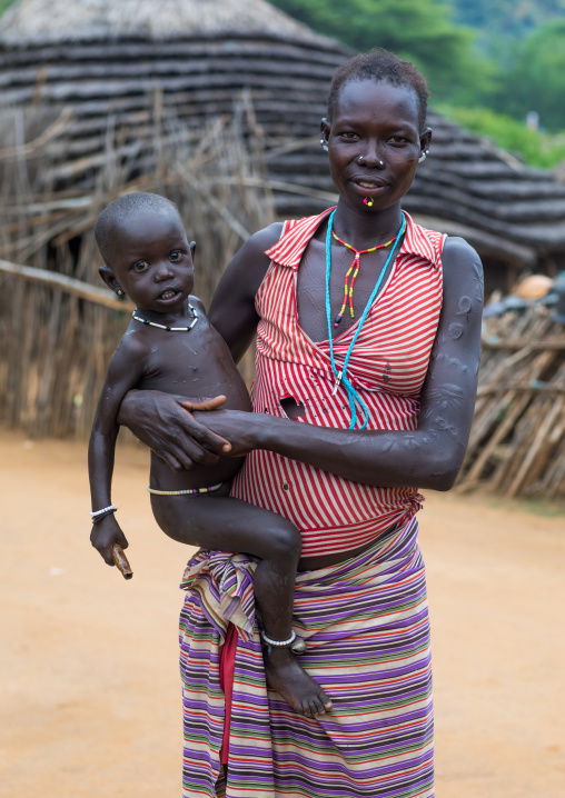 Portrait of a Larim tribe mother carrying her child, Boya Mountains, Imatong, South Sudan