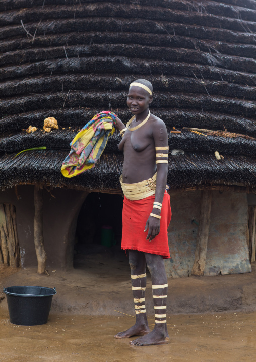 Portrait of a Larim tribe woman wearing bark bracelets as a sign of mourning, Boya Mountains, Imatong, South Sudan