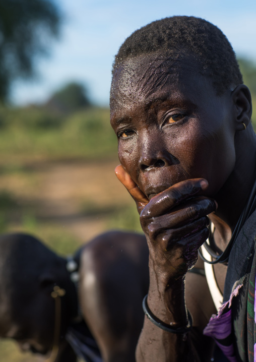 Portrait of a Mundari tribe woman with scarifications on the forehead, Central Equatoria, Terekeka, South Sudan