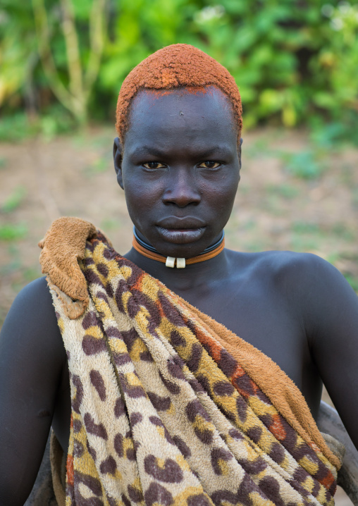 Portrait of a Mundari tribe man with hair dyed in orange with cow urine, Central Equatoria, Terekeka, South Sudan
