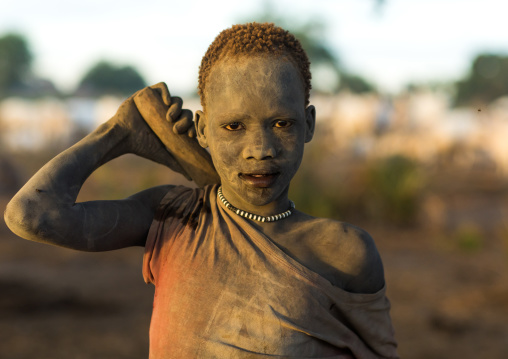 Mundari tribe boy covered in ash to protect from the mosquitoes and flies, Central Equatoria, Terekeka, South Sudan