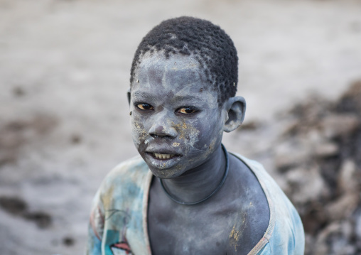 Mundari tribe boy covered in ash to protect from the mosquitoes and flies, Central Equatoria, Terekeka, South Sudan