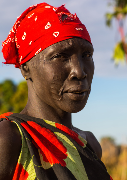 Portrait of a Mundari tribe woman with scarifications on the forehead, Central Equatoria, Terekeka, South Sudan