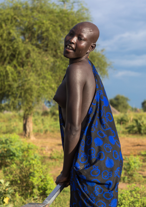 Mundari tribe woman pumping water in a well, Central Equatoria, Terekeka, South Sudan