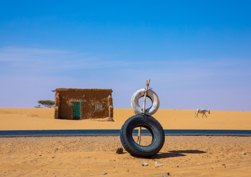 Tyres along the road to indicate a garage, Khartoum State, Khartoum, Sudan