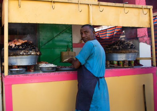 Chicken meat cooked on heated stones, Kassala State, Kassala, Sudan