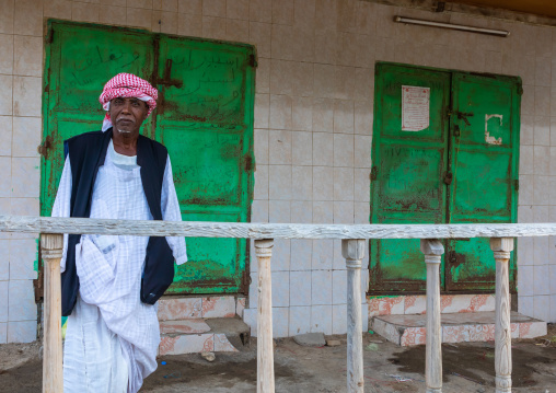 Sudanese man on the balcony of his house, Red Sea State, Suakin, Sudan