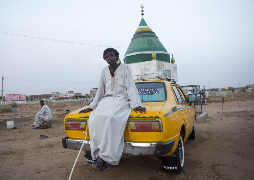 Sudan, Khartoum State, Khartoum, man sitting on a taxi