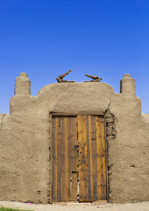 Sudan, Nubia, Sai island, crocodiles heads on a door
