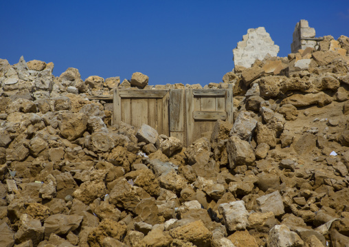 Sudan, Port Sudan, Suakin, wodden door in the middle of a ruined ottoman coral buildings