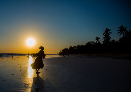 Girl Running On Beach During Sunset
