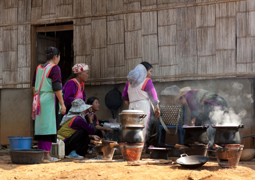 Lisu tribe women making food in ban nam rin village, Thailand
