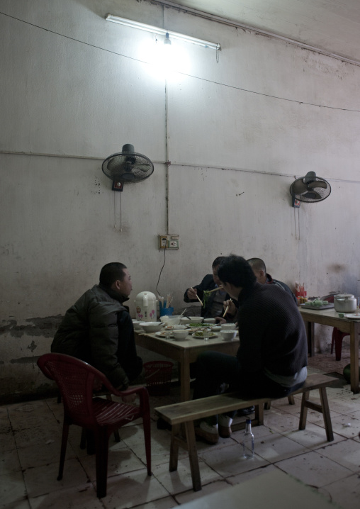 Men having a meal, Sapa, Vietnam