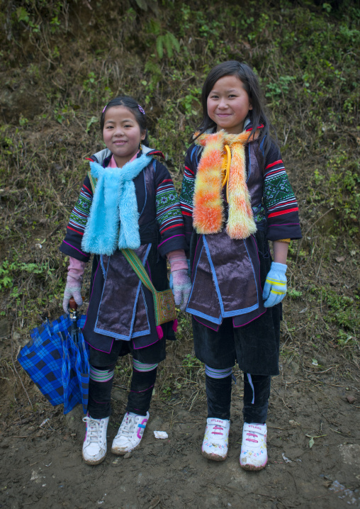 Black hmong girls wearing traditional scarves, Sapa, Vietnam