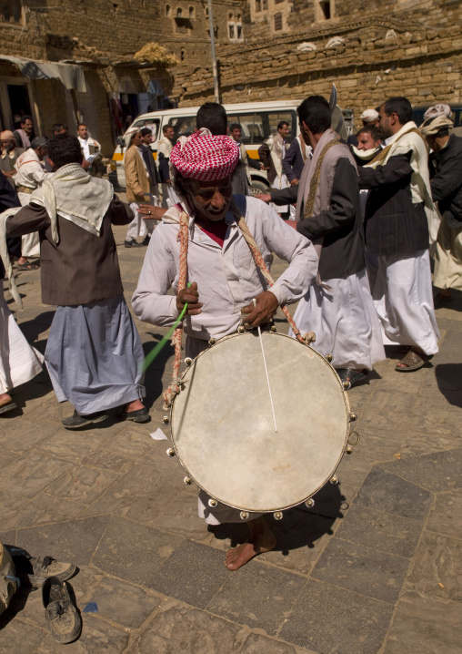Man Playing Drum At A Wedding In Thula, Yemen