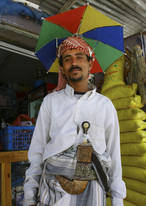 Man Wearing A Umbrella Over His Turban And Carrying A Dagger, Rada, Yemen