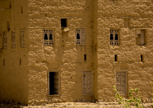 Facade Of A Traditional Mud Building With Wooden Carved Windows, Hadramaut, Yemen
