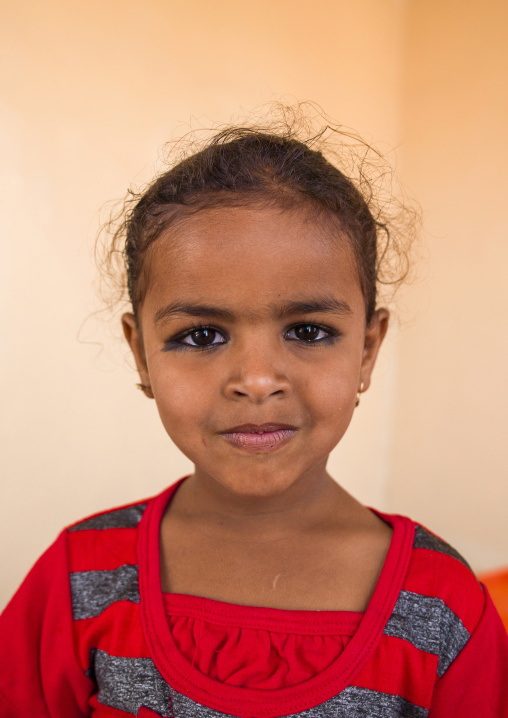 Portrait of a young bedouin girl with khol on her eyes, Ash Sharqiyah, Ibra, Oman