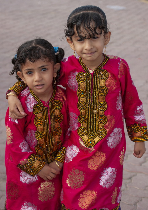 Bedouin girl wearing traditional clothing, Ash Sharqiyah, Sinaw, Oman